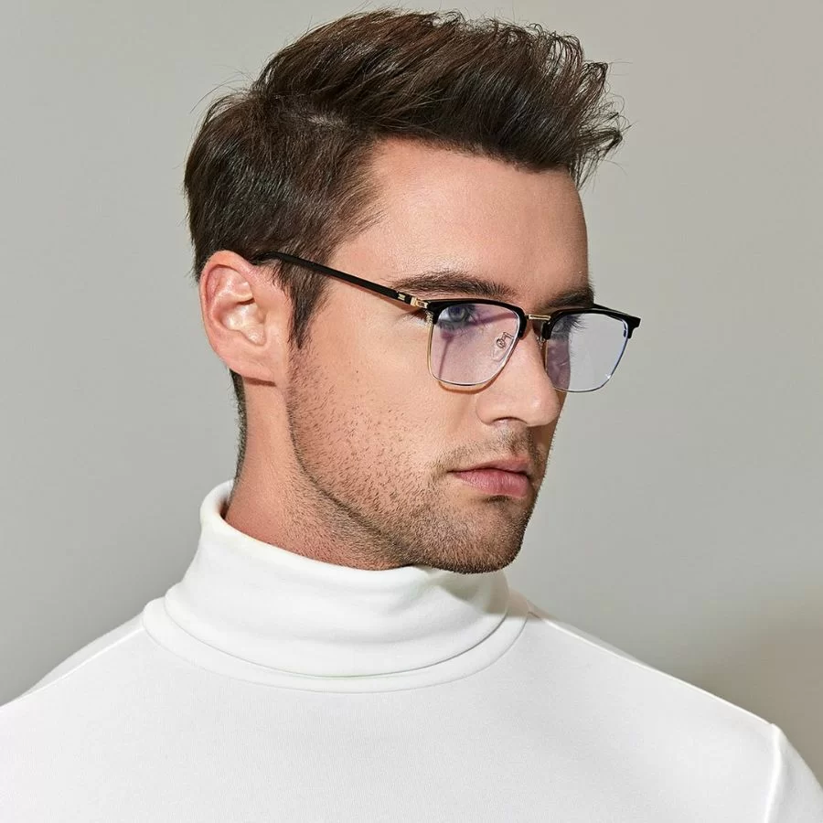 Mắt kính cho mặt tròn nam: 8 kiểu kính cận giúp mặt đẹp hơn (6) Người đàn ông đeo kính bán viền đầy tinh tế